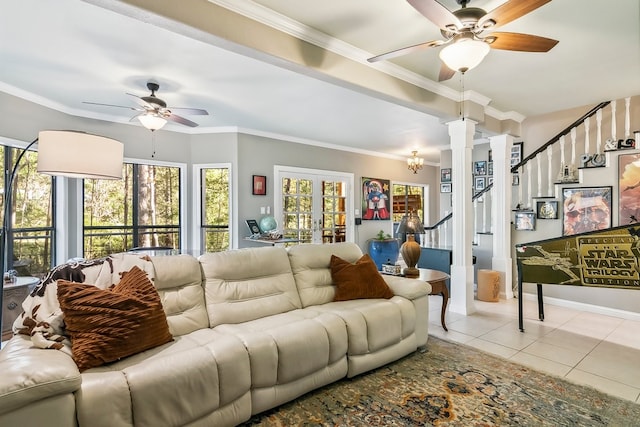 living room featuring decorative columns, ceiling fan, crown molding, and light tile patterned floors