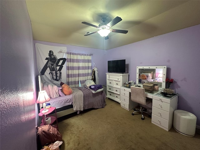bedroom with a ceiling fan, carpet, and vaulted ceiling
