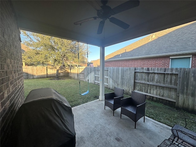 view of patio / terrace with a ceiling fan, a fenced backyard, and a grill