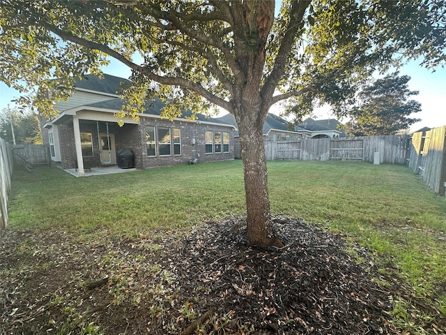 view of yard with a patio area