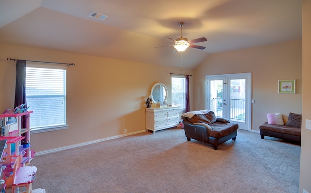sitting room with lofted ceiling, a ceiling fan, carpet flooring, and baseboards