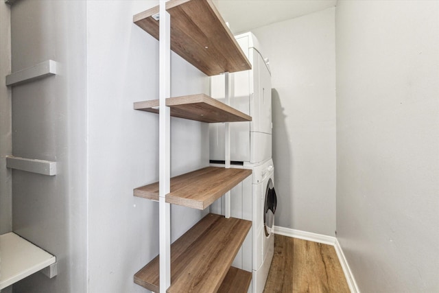 storage featuring stacked washer / dryer