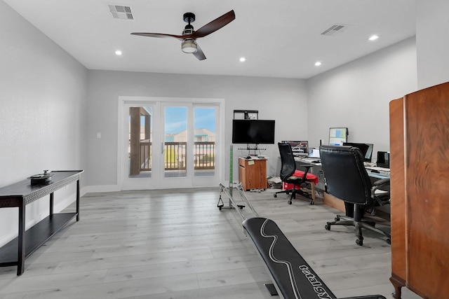 office area featuring light hardwood / wood-style floors and ceiling fan