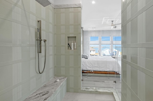 bathroom featuring a tile shower