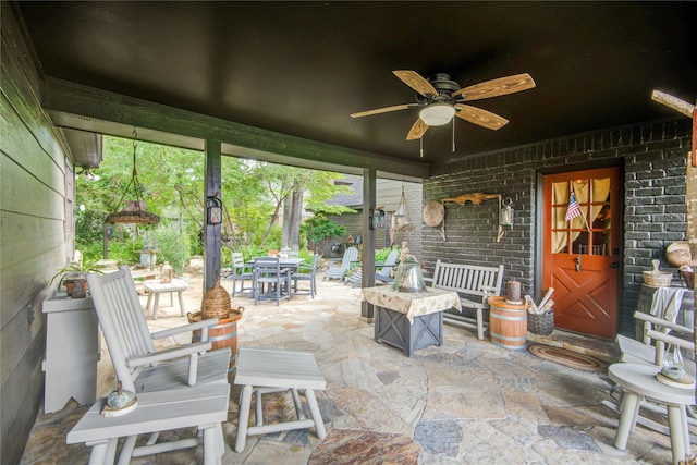 view of patio / terrace featuring ceiling fan