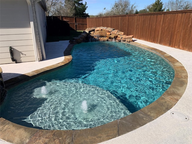 view of pool featuring pool water feature