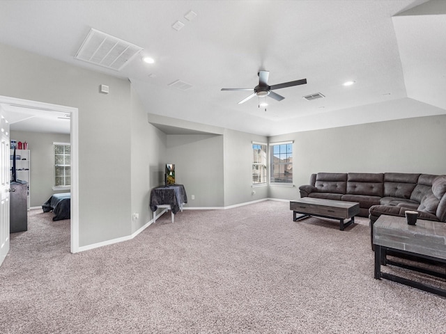 living room with carpet flooring and ceiling fan