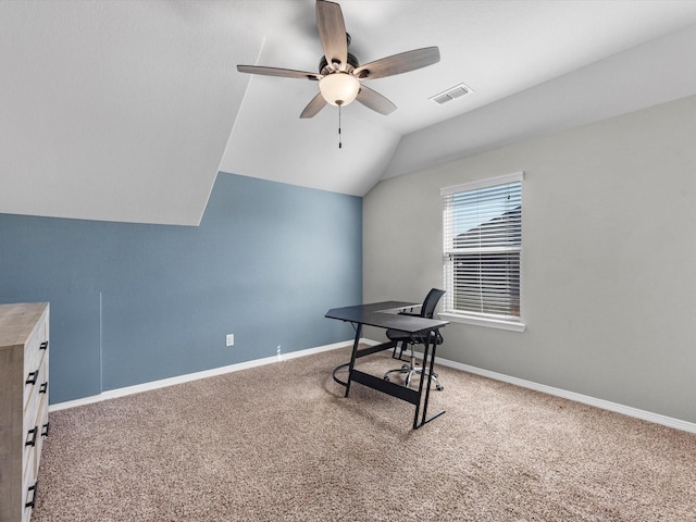 carpeted home office featuring ceiling fan and lofted ceiling