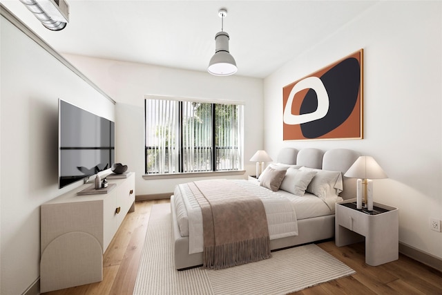 bedroom featuring light hardwood / wood-style flooring