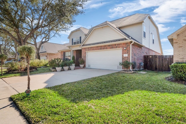 view of front of house with a garage and a front yard