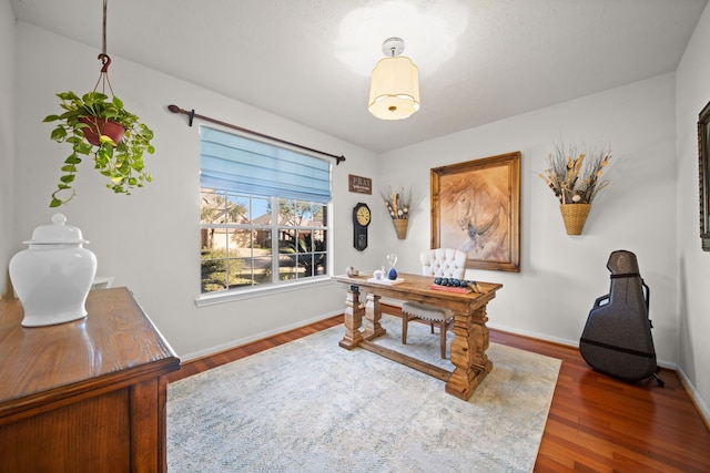 office area with dark hardwood / wood-style floors