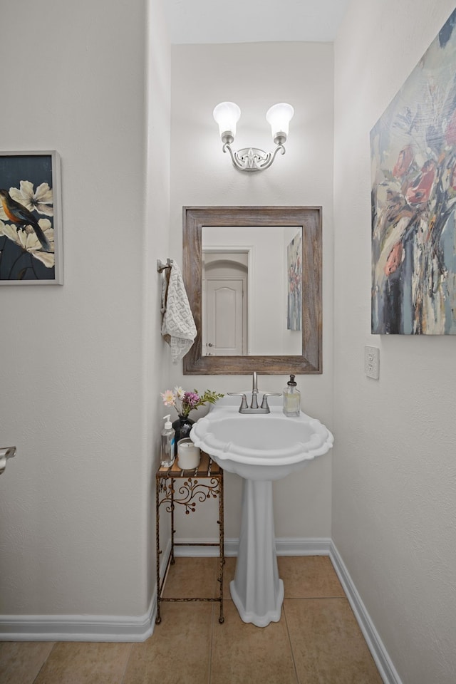 bathroom with tile patterned flooring