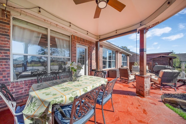 view of patio featuring ceiling fan and an outdoor living space