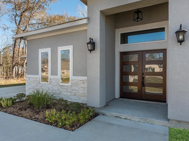 doorway to property featuring french doors