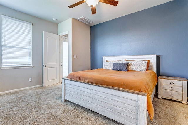 bedroom featuring ceiling fan and light colored carpet