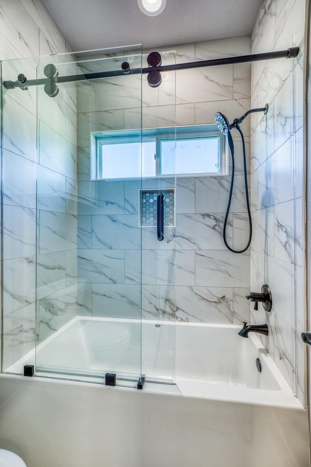 bathroom featuring enclosed tub / shower combo