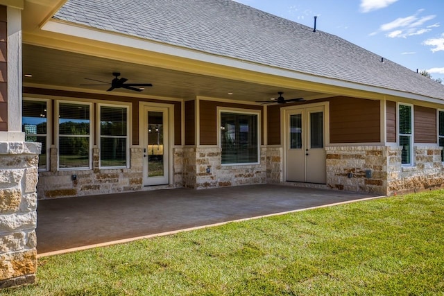 doorway to property featuring ceiling fan and a patio