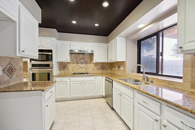 kitchen featuring sink, white cabinets, and stainless steel appliances