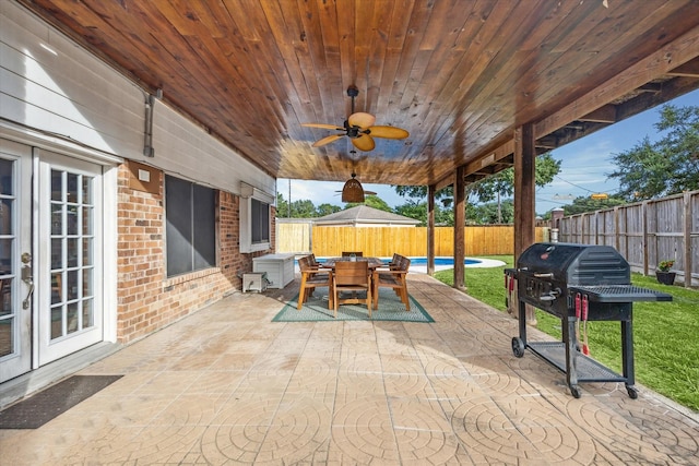 view of patio / terrace with a grill and ceiling fan