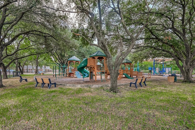 community playground featuring a yard