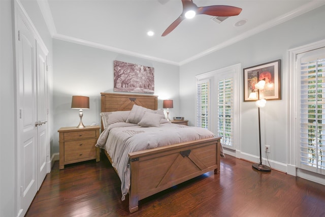 bedroom featuring ceiling fan, dark hardwood / wood-style flooring, crown molding, access to outside, and a closet