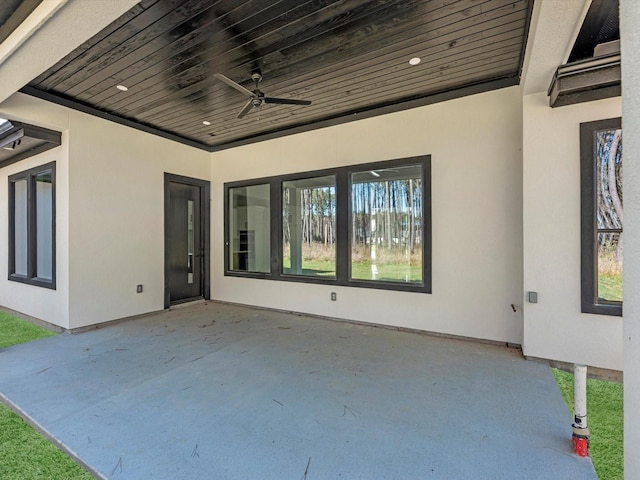 view of patio / terrace featuring ceiling fan