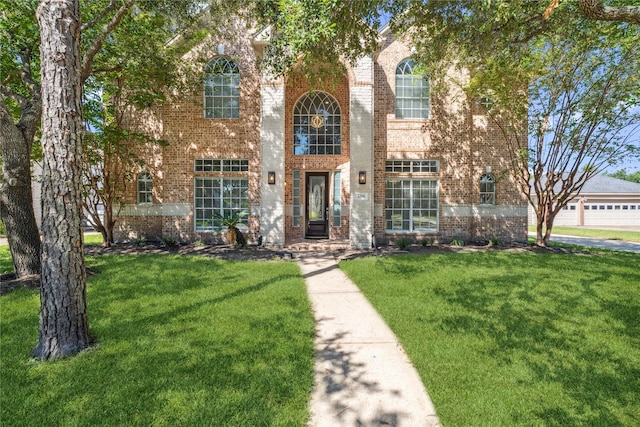 view of front of property with a front lawn