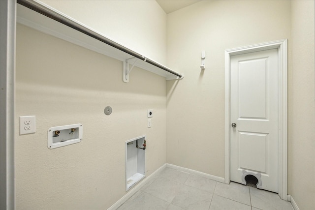 laundry room featuring hookup for an electric dryer, washer hookup, gas dryer hookup, and light tile patterned flooring