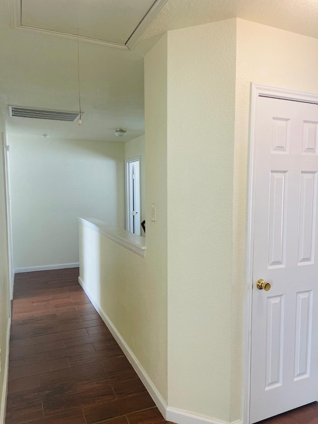 hall with dark hardwood / wood-style floors