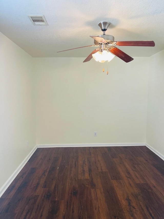 unfurnished room featuring dark hardwood / wood-style floors