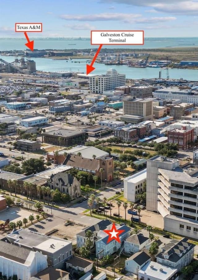 birds eye view of property featuring a water view