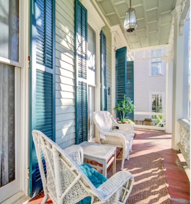 balcony featuring a porch