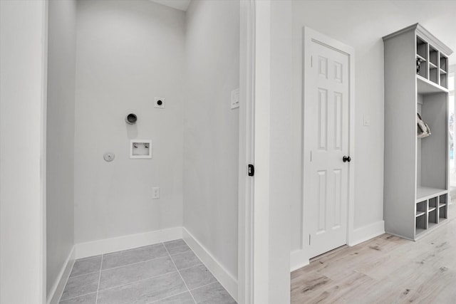 clothes washing area featuring washer hookup and hookup for an electric dryer