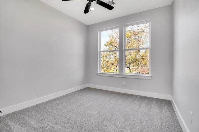 carpeted empty room with ceiling fan