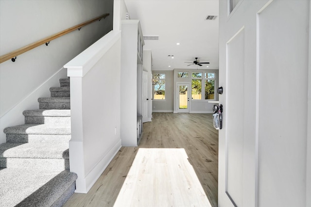 entryway featuring ceiling fan and light hardwood / wood-style flooring