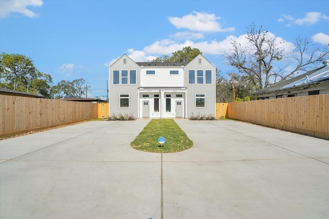 view of front of home featuring a patio