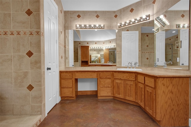 bathroom featuring vanity, a shower, concrete flooring, and tile walls