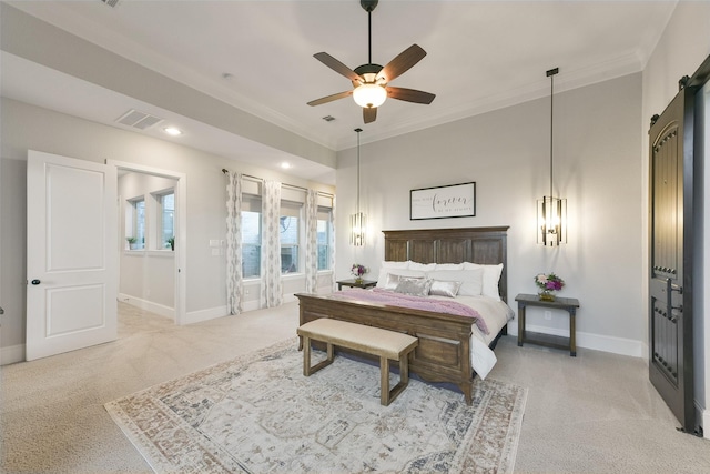 bedroom featuring a barn door, light colored carpet, ceiling fan, and ornamental molding