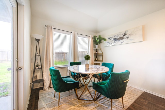 dining area featuring wood-type flooring