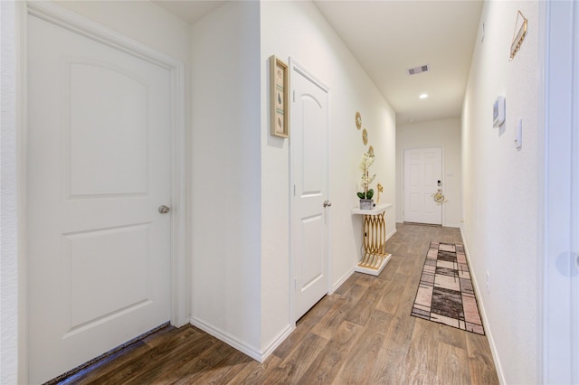 hallway featuring hardwood / wood-style floors