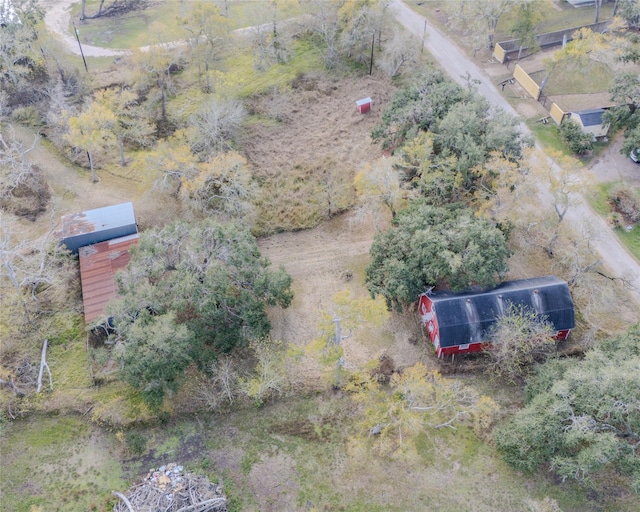 birds eye view of property featuring a rural view