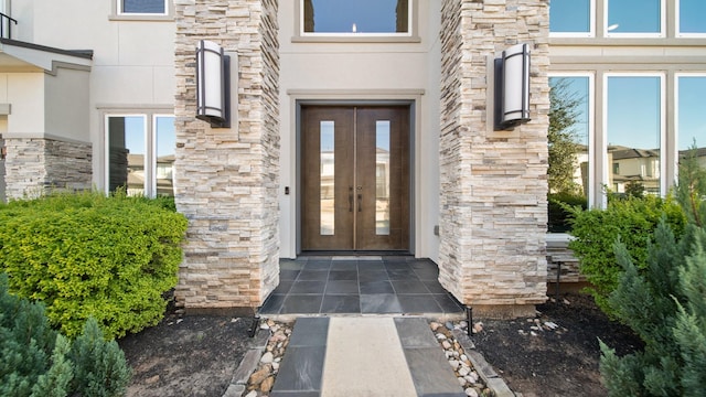 doorway to property featuring french doors