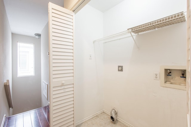 washroom featuring electric dryer hookup, light wood-type flooring, and hookup for a washing machine