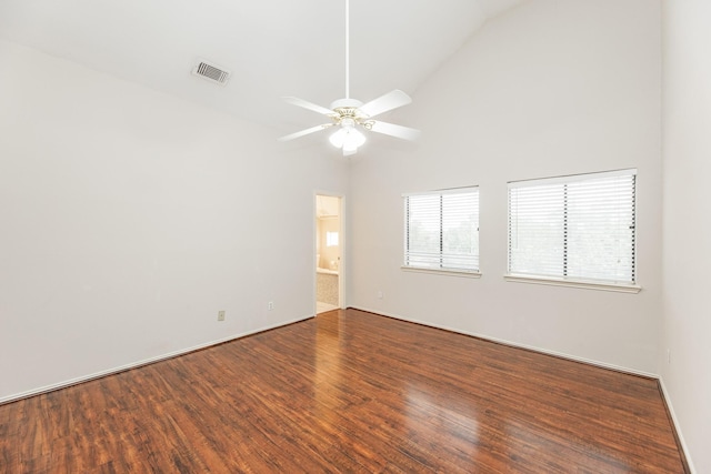 spare room with wood-type flooring, ceiling fan, and lofted ceiling