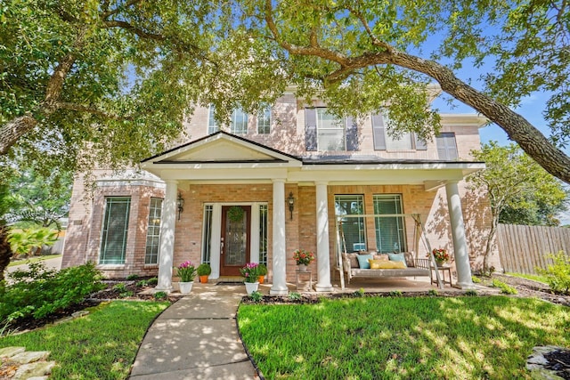 view of front of home featuring covered porch