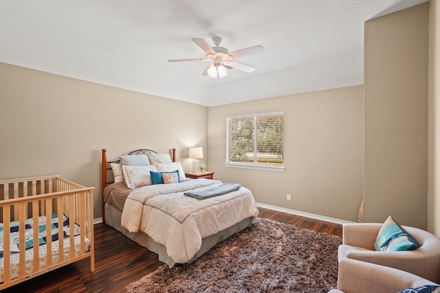 bedroom featuring ceiling fan and dark hardwood / wood-style flooring