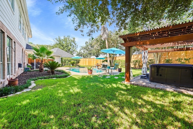 view of yard with a pool with hot tub and a patio area