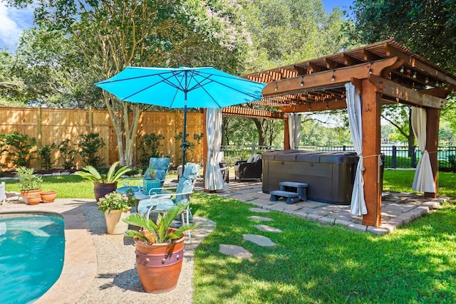 exterior space with a pergola, a swimming pool with hot tub, and a patio