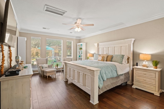 bedroom with ornamental molding, ceiling fan, and dark wood-type flooring