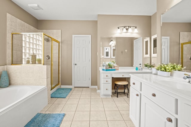 bathroom with vanity, tile patterned floors, and independent shower and bath